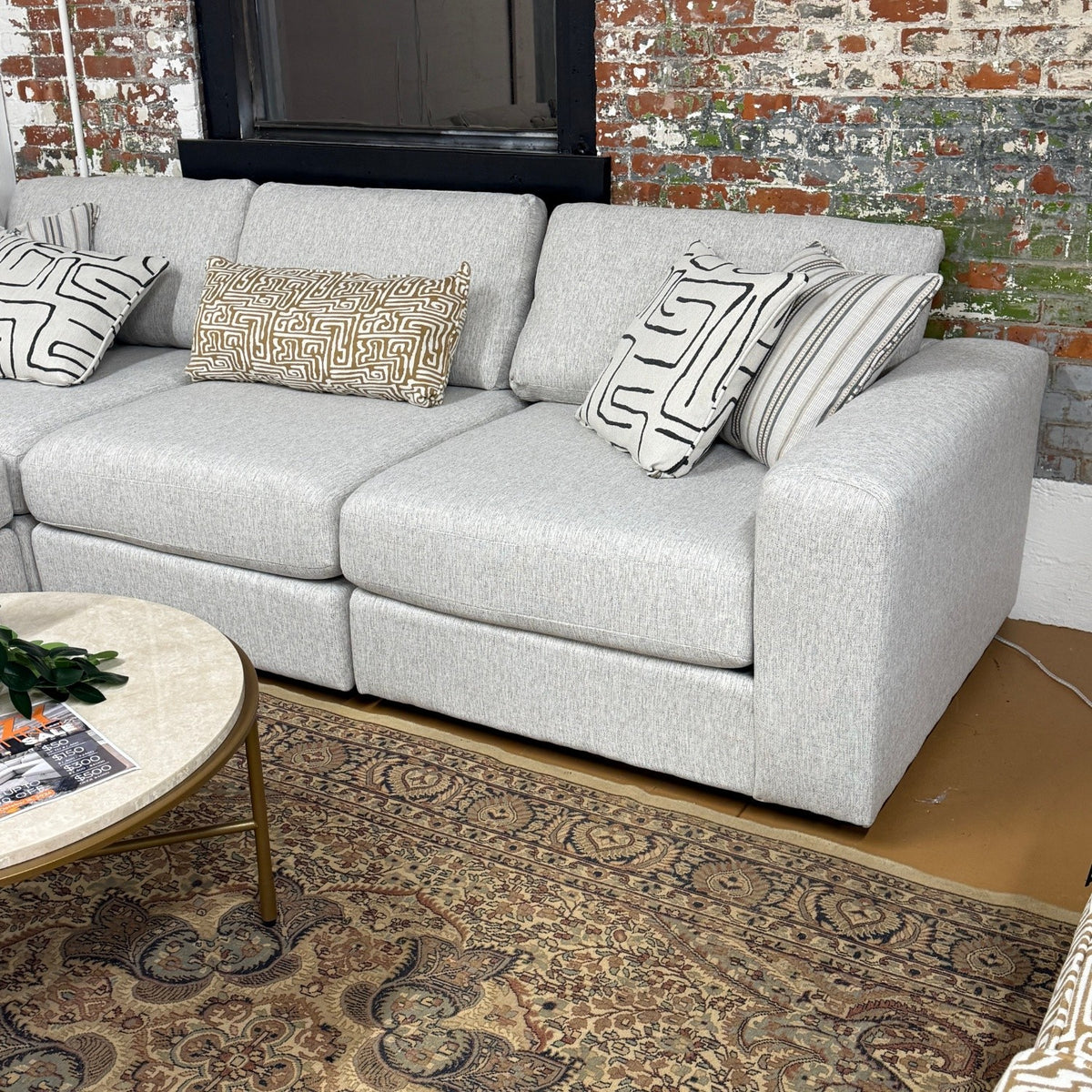 Fusion Barrington Modular Corner Sectional in neutral fabric, showing multiple interconnected sofa pieces with plush cushions.