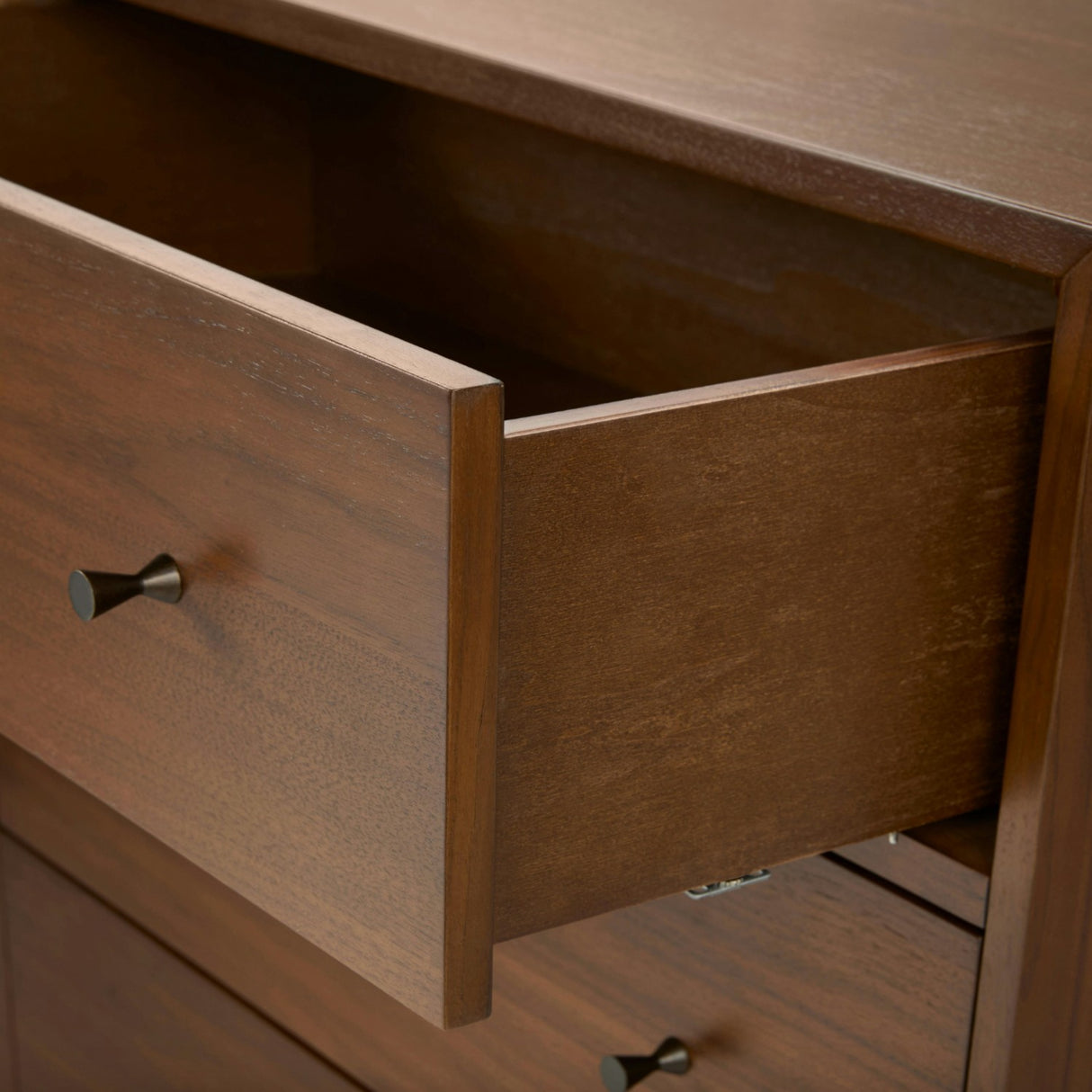 Walnut 5-drawer MCM-style dresser by Article with sleek mid-century modern design and smooth drawer fronts.