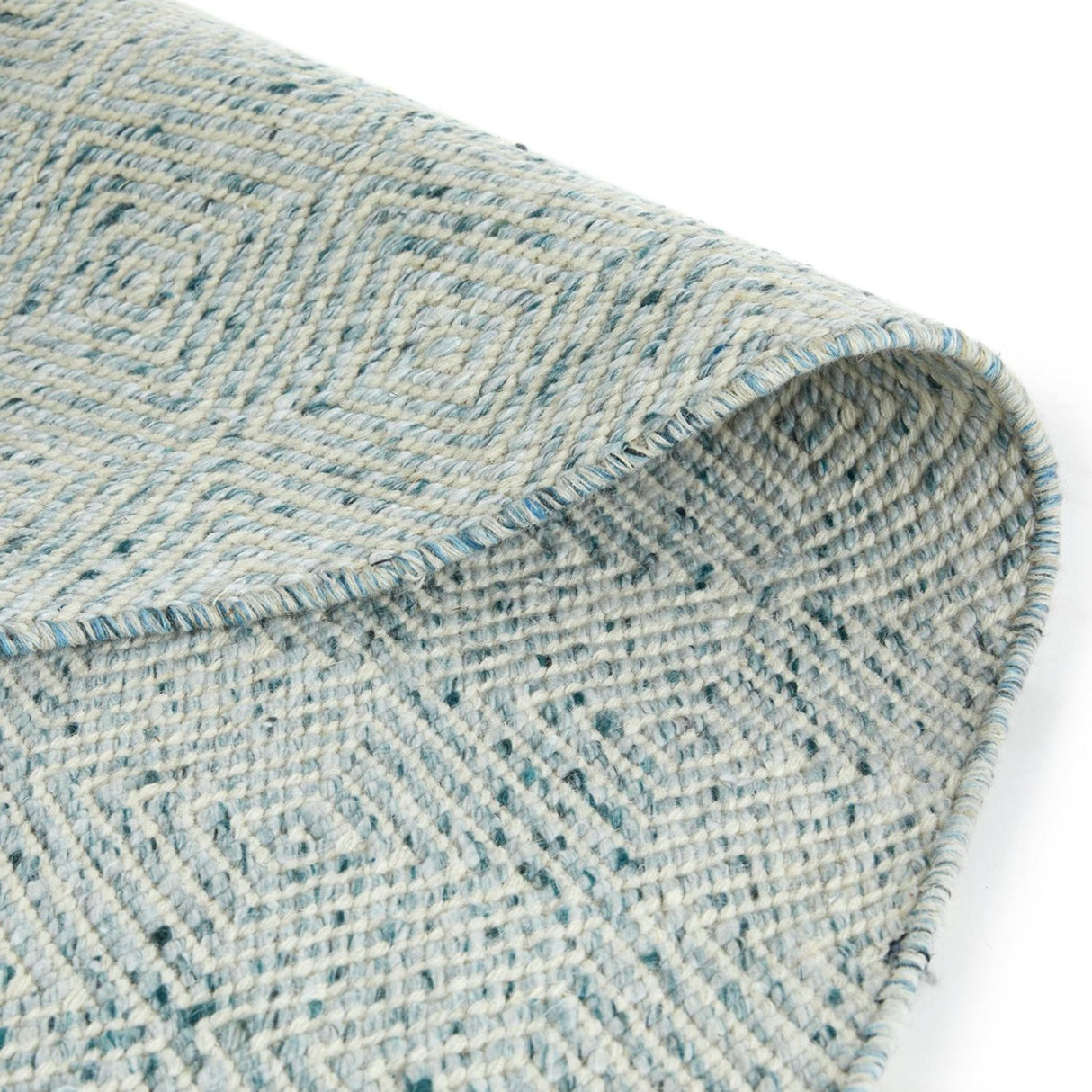 Medium-pile pearl blue rug by Article, 5' x 8' size, showcasing soft texture and stylish design on a clean floor surface.