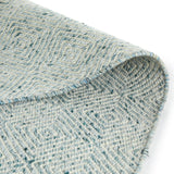 Medium-pile pearl blue rug by Article, 5' x 8' size, showcasing soft texture and stylish design on a clean floor surface.
