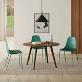 Woodland green MCM-style dining chair by Article with wooden legs and modern design, suitable for contemporary dining rooms.