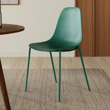 Woodland green Article MCM-style dining chair with wooden legs and curved backrest, modern and stylish for dining room decor.
