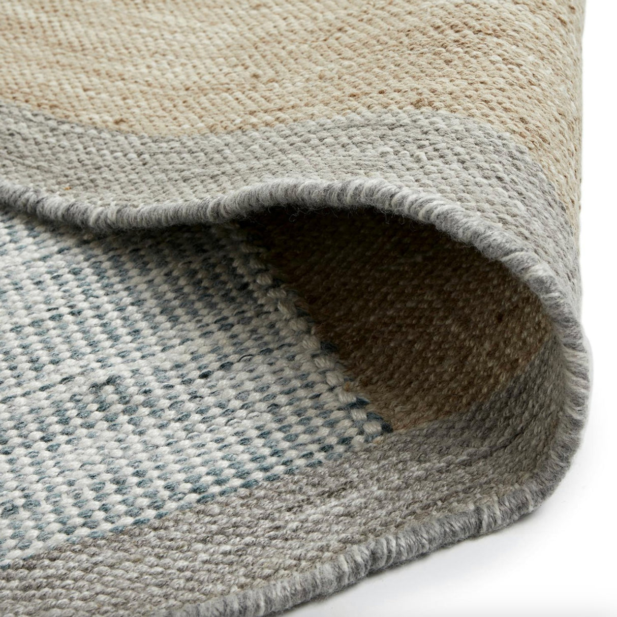 Article 8' x 10' Geode indoor/outdoor rug with a textured, patterned design in neutral tones, suitable for both indoor and outdoor spaces.