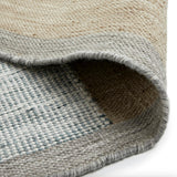 Article 8' x 10' Geode indoor/outdoor rug with a textured, patterned design in neutral tones, suitable for both indoor and outdoor spaces.