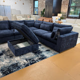 Pull Up A Couch Serenity Cloud 5-piece blue corner sectional with storage ottoman, showcasing plush upholstery and modern design.