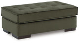 Oversized Caspian-Town accent ottoman by Signature Design Ashley, showing a plush fabric surface and sturdy wooden legs.
