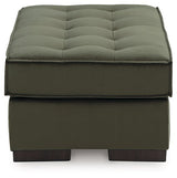 Side view of the Caspian-Town oversized accent ottoman by Signature Design, featuring a plush fabric and sturdy wooden legs.