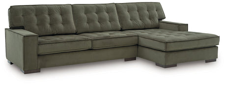 Angle view of Signature Design by Ashley Caspian-Town sectional with chaise, featuring plush fabric and modern design.