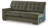 Caspian-Town sectional with chaise by Signature Design Ashley, featuring beige upholstery and modern design, viewed from an angle.