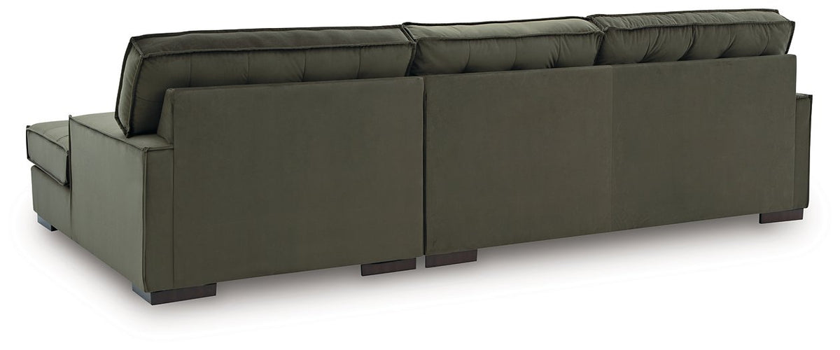 Back view of the Signature Design by Ashley Caspian-Town sectional with chaise, featuring plush cushions and contemporary design.