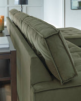 Caspian-Town sectional with chaise by Signature Design Ashley, featuring beige upholstery and detailed welt stitching.
