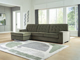 Caspian-Town sectional with chaise by Signature Design Ashley, featuring plush fabric and modern design in a living room setting.