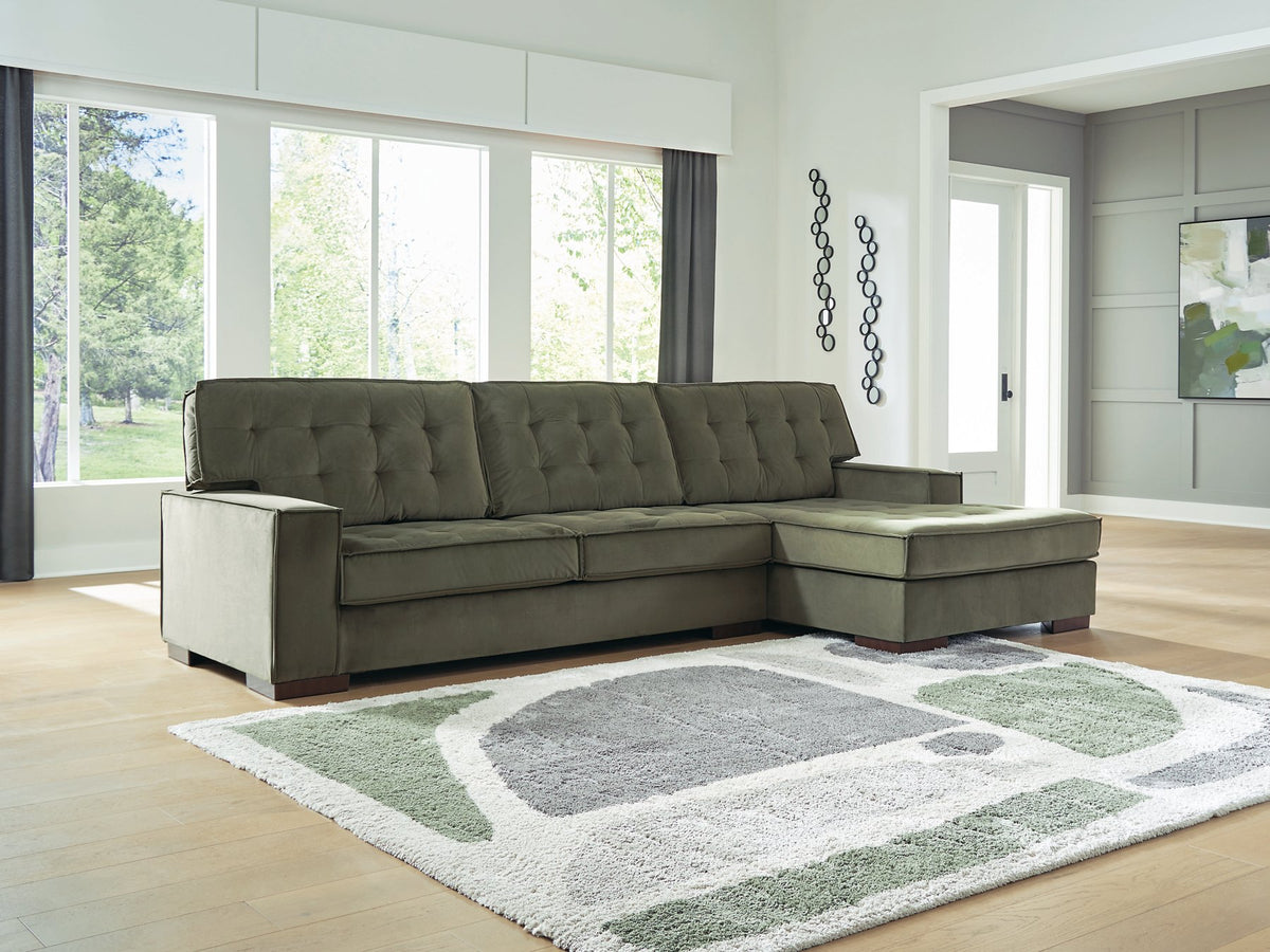 Caspian-Town sectional with chaise by Signature Design Ashley, showing plush fabric, modern design, and spacious seating arrangement.