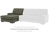 Signature Design by Ashley Caspian-Town sectional with chaise, featuring plush fabric and modern design in a stylish living room setup.