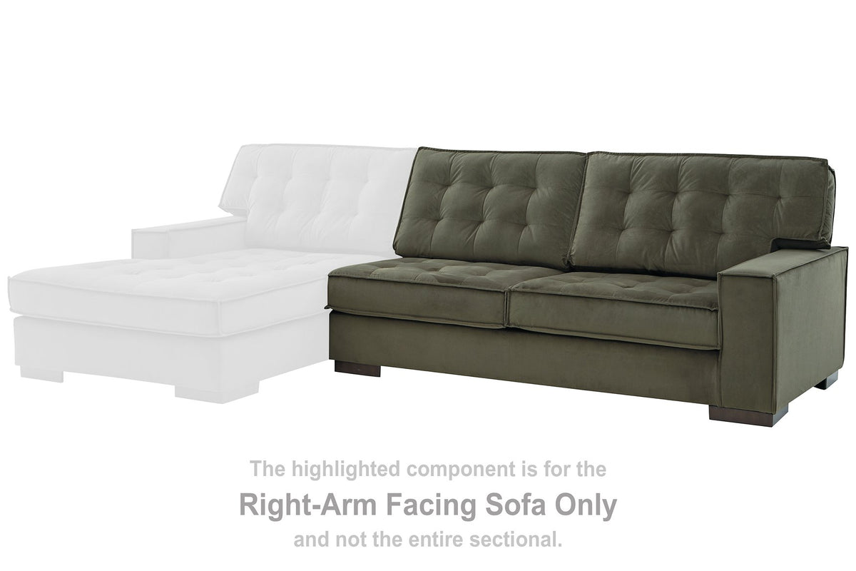 Signature Design by Ashley Caspian-Town sectional with chaise, featuring plush upholstery and modern style in a cozy living room setting.