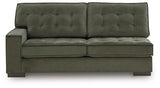 Signature Design by Ashley Caspian-Town sectional with chaise, featuring plush cushions and modern fabric in a stylish living room setting.