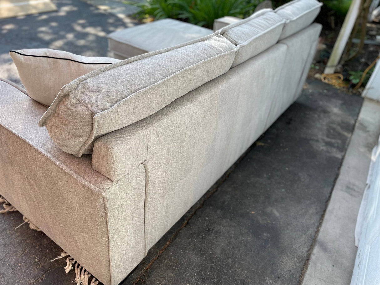 Gray 2 piece sectional with left-facing chaise, storage, and pop-up sleeper - Pull Up A Couch